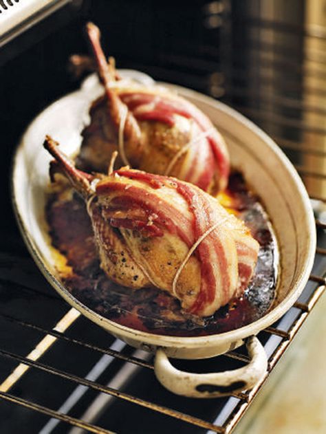 Roast partridge with cider gravy is a delicious winter recipe for frosty days by the fire.  20g butter 4 large fresh thyme sprigs 2 oven-ready partridges 6 rindless dry-cured smoked streaky bacon rashers, 4 left whole, 2 chopped 1 tbsp olive oil 1 small onion, thinly sliced 100ml cider 150ml homemade chicken stock 1 tbsp crab apple and cider jelly (I like Peyton & Byrne, in the Food from Kew range at shop.kew.org) or redcurrant jelly ½ tsp soft butter ½ tsp plain flour Watercress to garnish Partridge Recipe, Winter Season Food, Cider Gravy, Winter Baking Recipes, Quail Recipes, Healthy Winter Meals, Winter Baking, Winter Cooking, Winter Dishes