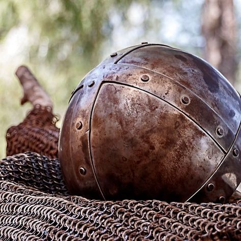 An ancient knightly helmet covered with rust, lying on a chain armor Rusted Armor, Copper Armor, Chain Armor, Cd Project, Armor Helmet, Elf Druid, Arthurian Legend, Paint Inspo, Armor Clothing