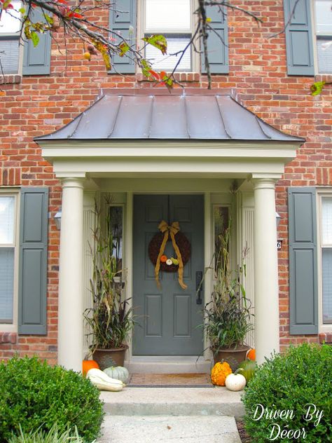 I love the look of the columns and pretty copper roof on this portico.  There is a "before" pic that is hard to believe!  Huge difference. Colonial Front Door Ideas, Colonial Front Door, Front Door Overhang, Door Overhang, Veranda Design, Front Door Ideas, Porch Kits, Driven By Decor, Building A Porch