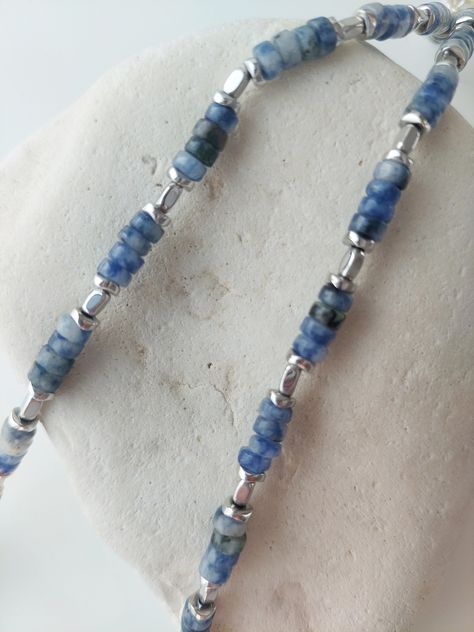 Choker made of sodalite beads (4х2 mm) and hematite. Adjustable in length with a chain. The use of sodalite as an amulet can awaken psychic abilities in a person, so the mineral is popular among practicing magicians. If you wear jewelry all the time, the stone will warn of imminent danger by changing color. Sodalite beads help to find a way out of the most difficult and confusing situations Sodalite will help strengthen bones; improve the functioning of the lymphatic system; normalize the condition of the heart and blood vessels; eliminate failures of the endocrine system; accelerate the recovery of the kidneys; improve the condition with liver pathologies; normalize pressure; reduce appetite; get rid of nightmares, improve sleep; relieve nervous tension. Sodalite is famous for its sorptio The Endocrine System, Blue Choker, Healing Gemstones, Reduce Appetite, Gemstone Choker, Blue Sodalite, Endocrine System, Gemstones Jewelry, Improve Sleep