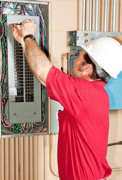 Master Electrician Working. Licensed master electrician working on an industrial , #affiliate, #Licensed, #master, #Working, #Master, #Electrician #ad Electrician Work, Commercial Electrician, Electrician Services, Electrical Maintenance, Breaker Panel, Parking Lot Lighting, Air Conditioning Services, Electrical Work, Electrical Installation