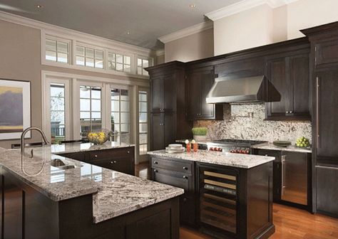 Beautiful dark wood cabinet kitchen with light color granite counters and stainless fixtures Grey Kitchen Colors, Dark Wood Kitchen Cabinets, Brown Kitchen Cabinets, Dark Wood Kitchens, Dark Wood Cabinets, Kitchen Wall Colors, Black Kitchen Cabinets, Basic Kitchen, Dark Kitchen