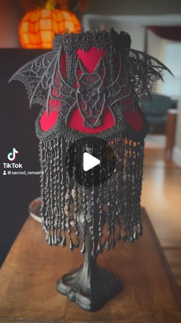 Sacred Remains on Instagram: "‘Lil bat boudoir lampshade! Available at the @salemnightfaire this October! I’ll be there the first weekend 10/18-10/19

#salemnightfaire 
#victorianlampshade 
#victorianlampshades 
#lampshades 
#handmade 
#handstitched 
#salem 
#salemmassachusetts 
#salemmass 
#salemma 
#darkaesthetic 
#gothaesthetic 
#gothdecor 
#gothhomedecor 
#darkhomedecor 
#interiorlighting 
#halloween 
#bats" Salem Mass, Victorian Lampshades, Dark Home Decor, Salem Massachusetts, Salem Ma, Goth Home Decor, Goth Decor, Goth Aesthetic, Halloween Bats