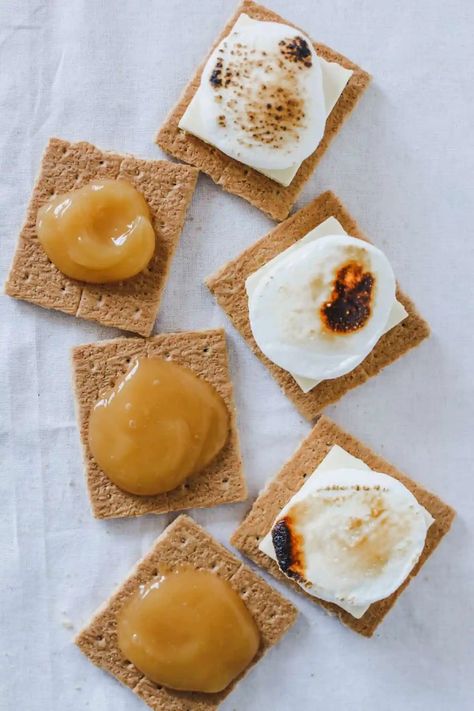 Check out these 12 S'mores combinations that will leave you drooling. From Choco Banana to Lemon Meringue Pie this campfire treat has never been better! #smores #ad #s'mores #dessert #easydessert Camping Dessert Ideas, Smores Variations, Healthy Smores, Fall Smores, Campfire Snacks, Marshmallow Smores, Chocolate Smores, Campfire Smores, Campfire Desserts