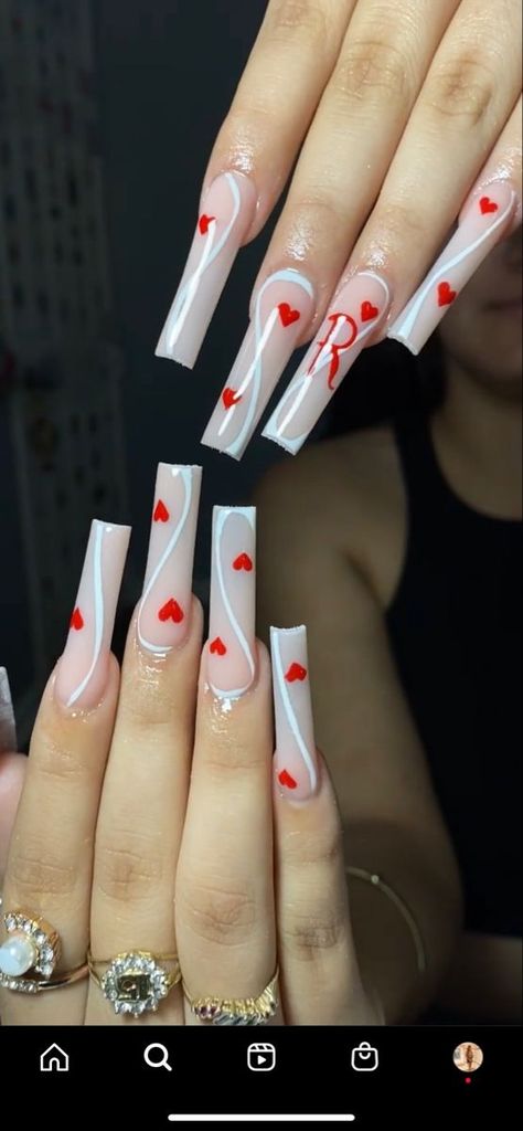 Cute Long Red Acrylic Nails, Long Acrylic Nails Coffin Valentines Day, Acrylic Nails Ideas Red And White, Valentines Nails White And Pink, Red And White Nails With Rhinestones, Red And White Nails With Initial, Long Nail Designs Red And White, Acrylic Nails With Initials On Them Red, White And Red Acrylic Nails With Design