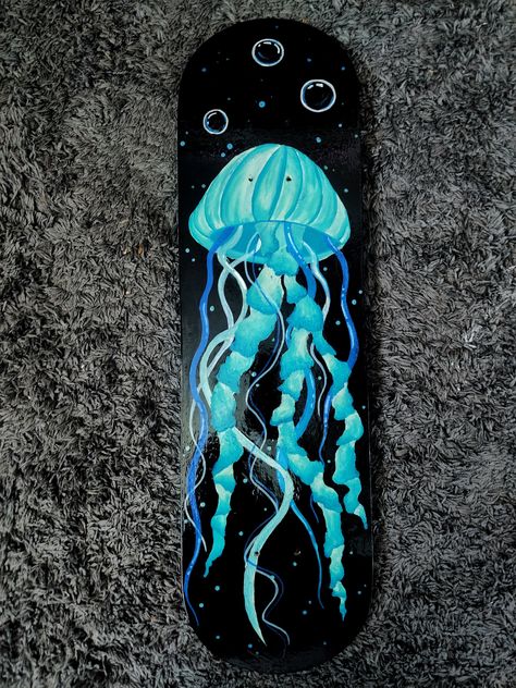 Teal and blue Jellyfish skateboard deck  Wall art or for outdoor sports use Back Of Skateboard Painting, Skateboard Drawing Ideas, Skateboard Custom Design, Skateboards Design Ideas, Bottom Of Skateboard Painting Ideas, Cool Griptape Designs, Jellyfish Skateboard, Skateboard Deck Wall Art, Painted Skateboard Ideas