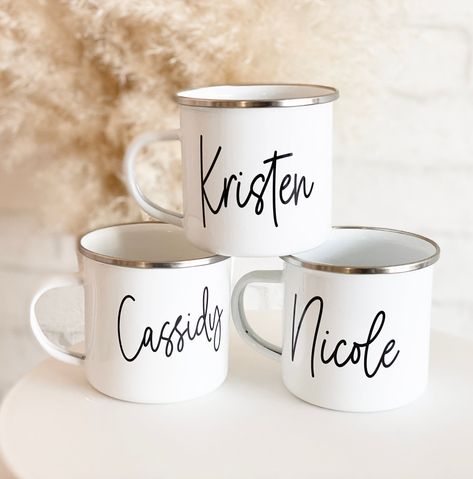 "Personalized Teacher Mugs with his/her name are a great gift for your kids' teachers over the holidays.  Campfire style mugs are lightweight and easy to use and perfect for hot or cold beverages. Details 1 Personalized Camp Mug with Name. The mug is white stainless steel and text is printed in black. Listing is for 1 mug ONLY - no other items are included.  Stainless Steel Height x Width = 3.5\" x 3\" 11oz Care Instructions: HAND WASH ONLY NOT microwave or dishwasher safe. ★ HOW TO PERSONALIZE Holiday Gifts For Friends, Campfire Party, Cute Bridesmaids Gifts, Mugs Ideas, Bridesmaid Mug, Mug With Name, Preschool Teacher Gifts, Xmas 2024, Camp Mug