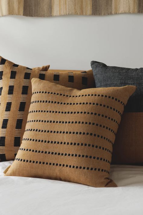 A coordinated grouping of our new Tan pillows, ready to complete any room in your home. -Berta Pillow - (1) 20x20" -Karo Pillow - (1) 20x20" -Bati Pillow - (1) 18x18" Karo Tribe, Tan Throw Pillow, Tan Pillows, Cream Throw, Soft Throw Pillows, Sofa Pillows Arrangement, Cushion Cover Designs, Wood Room, Living Room Pillows