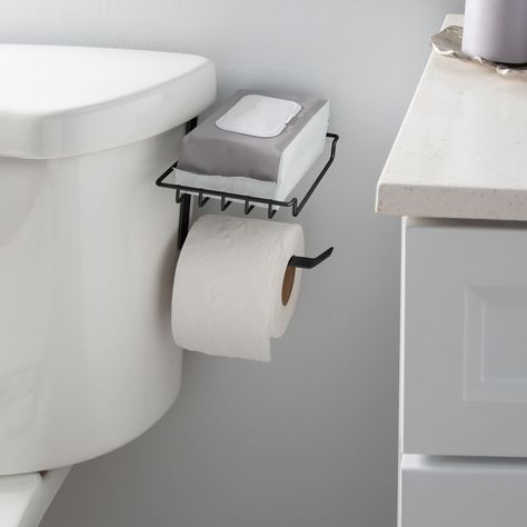 "Find the Bath Bliss Black Over the Tank Tissue Dispenser & Wipe Holder at Michaels. com. This innovative dispenser features an over the tank mechanism, allowing for easy installation without the need for drilling or additional hardware. Simply hang it over the tank of your toilet, and you're good to go. Designed with practicality in mind, your toilet paper is always within arm's reach, ensuring a seamless bathroom experience. This innovative dispenser features an over the tank mechanism, allowi Bathroom Wipes Holder, Tiny Bathroom Sink, Bathroom Wipes, Tiny Powder Room, Diy Toilet Paper Holder, Stacked Laundry Room, Wipe Holder, Bathroom Toilet Paper Holders, Guest Bathroom Decor