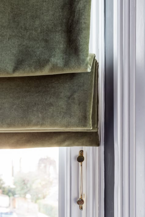 Green Velvet Roman Blinds, Roman Blinds In Dining Room, Roman Blinds Big Window, Green Roman Blinds Living Room, Velvet Roman Blinds, Roman Blinds Dining Room, Colorful Roman Shades, Roman Blind With Border, Roman Blind Fabric