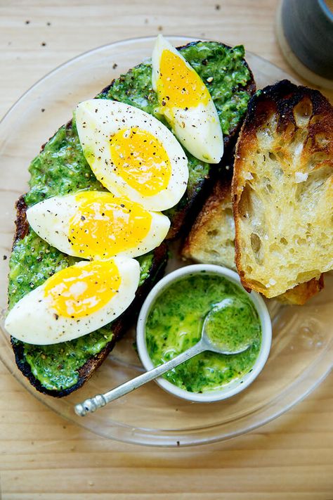 Meet: The Only Green Sauce You Need. Smear on toast. Drizzle over eggs. Or eat, as here, with jammy, 7-minute eggs. There is nothing you won’t want to slather this sauce on: grilled vegetables, cheese sandwiches, savory yogurt bowls, roast chicken... the possibilities are endless. It's made with herbs, avocado, olive oil, lemon, garlic, salt and pepper ... comes together in no time. #avocados #greensauce #sevenminuteeggs #sourdough #toast #eggs #jammyeggs #sevenminuteeggs Savory Yogurt, Toast Eggs, Yogurt Bowls, Sourdough Toast, Avocado Sauce, Weekend Cooking, Veggie Dip, Yogurt Bowl, Mashed Avocado