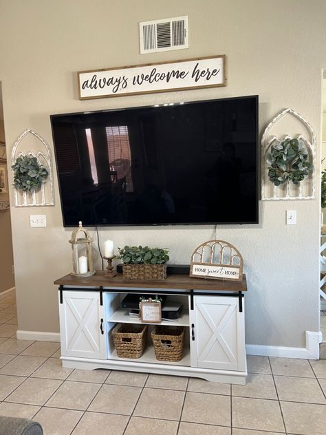 Above Mounted Tv Decor, Farmhouse Tv Wall Design Ideas, How To Decorate Under A Mounted Tv, Under The Tv Decor, Tv Display Ideas, Above The Tv Wall Decor, 75 Inch Tv On Wall Ideas, Tv Mounted On The Wall In Living Room, Hanging Tv Ideas Living Room