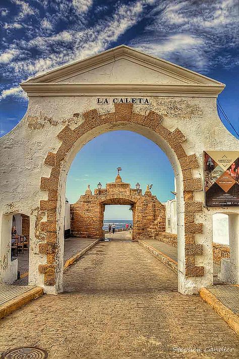 Entrance to the causeway that leads to Castillo de San Sebastian, La Caleta, Cadiz, Spain Cadiz Spain, Spain Vacation, Spain And Portugal, Cadiz, San Sebastian, Andalusia, The Castle, Beautiful Buildings, Spain Travel