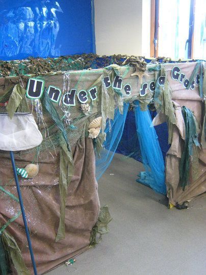 Under The Sea Grotto- perfect corner for quiet activities and reading Under The Sea Crafts, Ocean Classroom, Ocean Theme Classroom, Sea Activities, Role Play Areas, Ocean Unit, Class Displays, Underwater Theme, Interactive Classroom