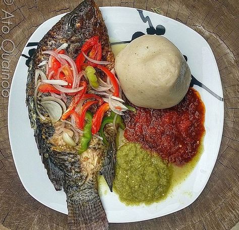 Ghanaian dish Ghana Banku And Tilapia, Local Dishes In Ghana, African Bites, Dishes Photography, Ghana Trip, Ghanaian Dishes, Ghana Travel, Ghana Food, Ghanaian Food