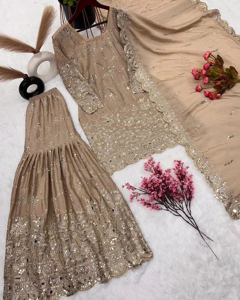 **👉 Rate:-1549+ship/-* Presenting New Sharara Collection Faux Georgette Top-Bottom And Dupatta Set Fully Stitched Ready To Wear 🔥😍🥰* *Fabric Detail* 💃👚*Top*👚💃 *Top Fabric* :Pure Heavy Chinnon Silk With Heavy Embroidery Sequence Work with Real Mirror Hand Work With Full Sleeve *Top Inner* :Heavy Micro Cotton *Top Length* : 36-37 Inch *Top Size*. : *M(38),L(40), Xl(42), Xxl(44)* *(FULLY STITCHED READY TO WEAR)* ���💃👚 *Sharara*👚💃 *Sharara Fabrics* :Pure Heavy Chinnon Silk With Embrodary Si... Golden Gharara, Golden Sharara, Roka Outfits, Punjabi Sharara Suits, Mirror Hand Work, Punjabi Sharara, Full Sleeve Top, Georgette Tops, Sharara Suit