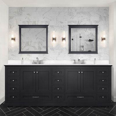 The Duke's collection was designed having in mind the perfect balance between functionality and style, nicely complimenting a variety of bathroom decors and blending in with contemporary, modern, minimalist, or Scandinavian displays. Available in 4 different sizes and beautiful neutral colors, with marble and quartz countertop options, this deluxe cabinet is compatible with an 8-inch widespread faucet, ensuring a hassle-free installation ideal for the DIY-er enthusiast! The multiple storage spaces easily accommodate your bathroom essentials, while the unique finishes and design add a sophisticated, elegant touch to your washroom Base Finish: Espresso, Top Finish: White Quartz | Red Barrel Studio® Dukes 84 in. W x 22 in. D Double Bath Vanity, White Quartz Top, & 34 in. Mirrors Quartz Top in Sleek Bathroom, Double Bath, Widespread Faucet, Countertop Options, Bathroom Vanity Base, Quartz Countertop, Double Sink Bathroom, Vanity Countertop, Double Sink Vanity