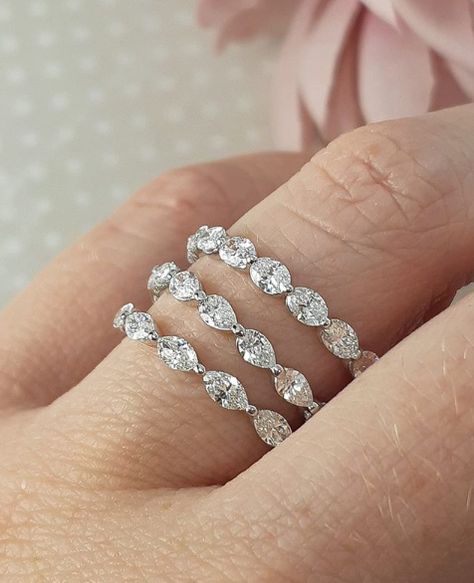 fancy cut diamond eternity rings.  horizontally set oval diamonds (top) Pear cut diamonds (centre) and marquise cut diamonds (bottom)  unique and usual choices for eternity or wedding rings. perfect for stacking too Eternity Ring Diamond Marquise, Oval Diamond Eternity Ring, Eternity Rings Diamond, Wedding Band Oval Diamond, Pear Shaped Eternity Band, Marquise Diamond Eternity Band, Marquise Eternity Ring, Unique Eternity Ring, Horizontal Oval Wedding Band