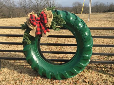 Tractor Tyre Christmas Wreath, Tractor Tire Wreath Christmas, Tractor Tire Wreath, Tire Christmas Decorations, Tractor Tire Ideas, Farm Christmas Decorations, Tire Wreath, Tire Decor, Tire Ideas