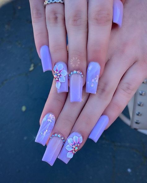 Short Lavender Nails With Flowers, Lavender Nails With Rhinestones Bling, Lilac Nails With Diamonds, Purple Acrylic Nails With 3d Flowers, Short Purple Acrylic Nails With Rhinestones, Quinceanera Purple Nails, Lavender Quince Nails Short, Purple 3d Flower Nails, Purple Nails With 3d Flowers