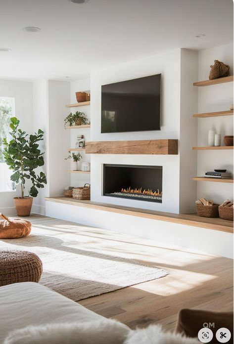 Grand Modern Fireplace, Fireplace Side Benches, Modern Electric Fireplace With Built Ins, One Built In Next To Fireplace, Ways To Hide Sump Pump In Basement, Living Room Built In Vaulted Ceiling, Uneven Fireplace Built Ins, Bench Around Fireplace, Shelving By Fireplace Floating