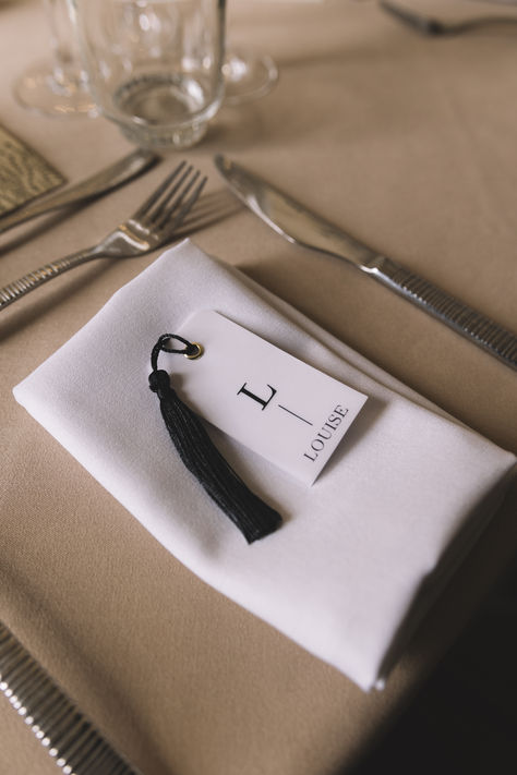 Monochrome wedding place name tag for luxe city wedding with black tassel | wedding place name | wedding decor ideas | wedding tablescape | chic city wedding | Lauren Elliott Photography Black And White Place Setting Wedding, Name Tag Wedding Table, Monochrome Wedding Decor, Monochrome Wedding, Wedding Name Tags, Monochrome Weddings, Place Card Table Wedding, Black And White Wedding Theme, Black Napkins