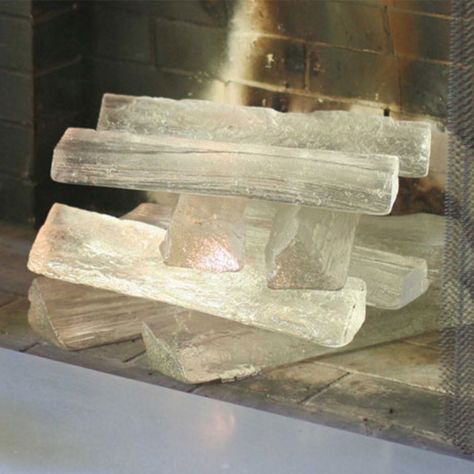 Crystal glass fireplace logs are a dramatic alternative to firewood. Here are multiple ways to achieve the look of selenite crystal glass fireplace logs. Fireplace Glass Rocks, Acrylic Rod, Fireplace Logs, Small Fireplace, Glass Votive Candle Holders, Glass Rocks, Glass Fireplace, Glass Cube, Focal Points