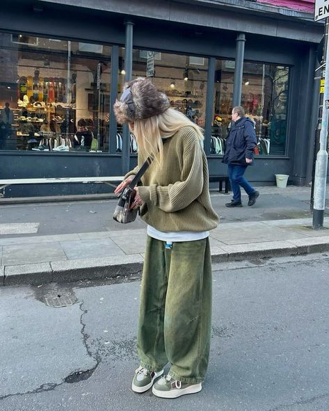 How about her color? 🫛 Outfit info 👇🏻 • • • 📸 @daisybirchalll 🇬🇧 👔Top : runge 👖Bottom : the ragged priest 👞Shoes : clints 👜Bag : carhartt • • • • • • fur bucket hat, light khaki knit, baggy khaki jeans, cross bag, khaki sneakers, women’s outfit, united kingdom Bucket Hat Outfits, Khaki Sneakers, Outfit Info, Fur Bucket, Fur Bucket Hat, Hat Light, Khaki Jeans, The Ragged Priest, Ragged Priest