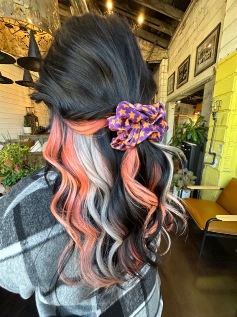 Black Hair With Orange And Purple Highlights, Orange Hair With Raccoon Tail, Dark Brown Hair With Bright Colors, Dark Fun Hair Color Ideas, Black Orange Blonde Hair, Blonde Halloween Hair, Spooky Season Hair Color, Halloween Themed Hair Color, Orange Black And Blonde Hair