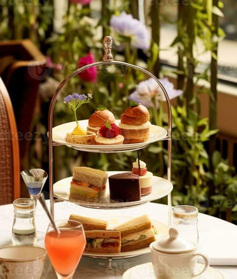 Afternoon tea in the restaurant garden, English tradition and luxury service, tea cups, cakes, scones, sanwiches and desserts, holiday table decor and afternoon tea stand, generative ai Afternoon Tea Stand, Desserts Holiday, Tea Stand, Restaurant Garden, Luxury Service, Holiday Table Decor, Vector Character Design, Holiday Table Decorations, Luxury Services