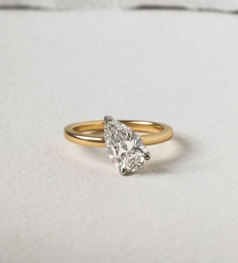 NORTH WEST✨ ‘North West’ setting 1.70ct Pear cut F VVS2 Two Tone 18k Gold Available in store Ready to Ship🚢 #northwestring #pearcut #engagementring #hattongarden #hattongardenjeweller #londonjewelers #eastwest Pear Diamond Ring, Engagement Ring Pear, Pear Cut Ring, Pear Ring, Engagement Ring For Her, Pear Engagement Ring, Ring Moissanite, Platinum Metal, Pear Cut