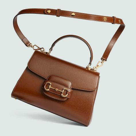 Shop the Gucci Horsebit 1955 medium bag in brown at GUCCI.COM. Enjoy Free Shipping and Complimentary Gift Wrapping. Gucci Horsebit Bag 1955, Gucci Top Handle Bag, Gucci Top, Designer Top, Bags Gucci, Italy Print, Medium Bag, Gucci Horsebit, Top Handle Bags