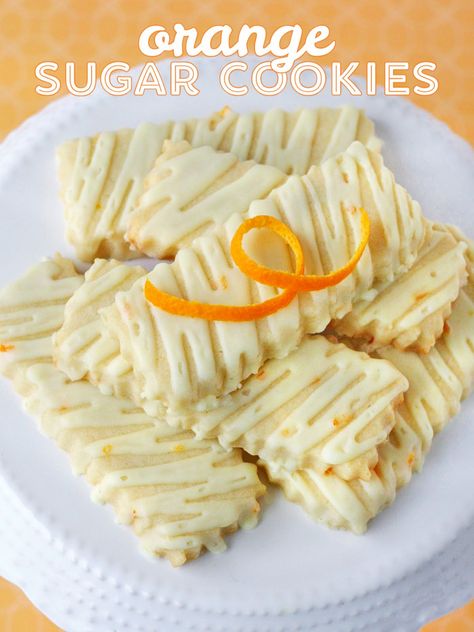 Delicious Orange Sugar Cookies are flavored with fresh orange zest and topped with a delicious orange glaze! Cut out into your favorite shapes for a delicious, sweet treat! Great year round! // Glorious Treats Orange Sugar Cookies, Fancy Treats, Cut Out Cookie Recipe, Baking Treats, Rolled Sugar Cookies, Orange Glaze, Cookie Flavors, Fresh Orange, Cookie Party