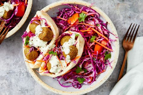 Falafel Pita Pockets with Red Slaw and Coriander Yoghurt | Marley Spoon Red Slaw, Falafel Pita, Delicious Vegetarian Dinner, Vegetarian Meat, Pita Pockets, Marley Spoon, Vegetarian Cabbage, Recipes Appetizers, Meal Kit