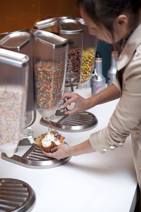 Ice Cream Topping Dispenser, Ice Cream Shop Organization, Soft Ice Cream Ideas, Small Ice Cream Shop Design, Ice Cream Toppings Ideas, Ice Cream Store Aesthetic, Ice Cream Business Ideas, Ice Cream Parlor Aesthetic, Soft Serve Ice Cream Shop