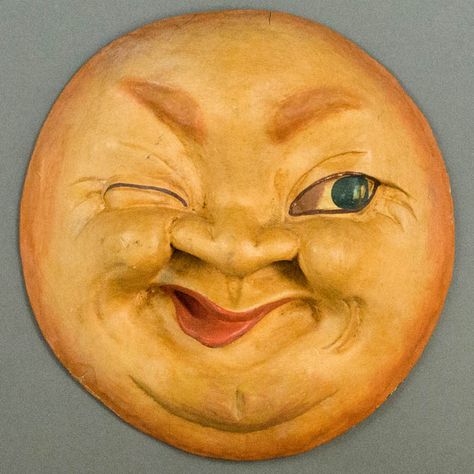 This Man in the Moon Plaque is carved from wood and hand painted, made in the 20th century. A winking man in the moon has long been a popular image in art and decorative arts particularly in the Victorian and Art Nouveau periods. The Man in the Moon frequently has appeared in advertisements for various products. Extant plaques as promotions for cigar manufacturers resembling the offered plaque are known though they generally depict the moon smoking a cigar. Faces Of The Moon, Man In The Moon, Sun With Face, Moon And Sun Face, Moon And Sun With Face, Man In The Moon Wood Carving, Vintage Man In The Moon Faces, Halloween Moon, Vintage Moon