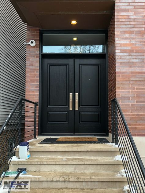 Who else loves the modern look of a good black door? These ProVia double doors with transom were recently installed in Chicago. Contact us for your next door project: https://www.nextdoorandwindow.com/.    #nextdoorandwindow #stormdoor #proviadoors Black Front Door With Transom, Front Door Double Doors Entrance Modern, Tall Front Door Entrance, Modern Black Doors Entrance, Black Double Doors Entrance, Modern Front Double Door, Black Exterior Doors Front Entry, Wooden Double Front Doors Entrance, Stairs Case Design