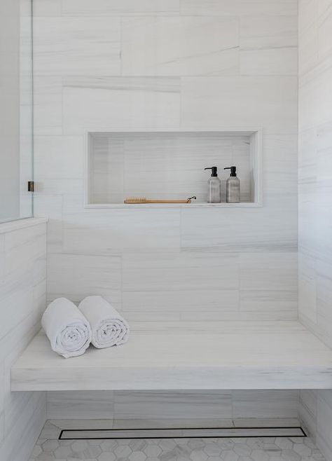 White Hexagon Shower Floor, Floating Shower Bench, Hexagon Floor Tiles, Marble Shower Walls, Tile Shower Niche, Blue Laundry Rooms, Herringbone Wall, Off White Kitchens, Shower Wall Tile