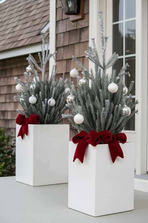 25 Beautiful Christmas Planter Ideas Christmas Planters Outside Front Porches, Christmas Planter Ideas, Evergreen Planters, Christmas Planter, Planters Ideas, Front Porch Planters, Painted Pinecones, Winter Planter, Porch Planters