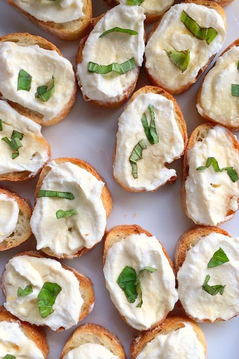 Ricotta with Lemon, Basil, and Honey Bruschetta | reluctantentertainer.com Ricotta Bruschetta, Honey Ricotta, Toasted Baguette, Fresh Ricotta, Easter Appetizers, Fingerfood Party, Bruschetta Recipe, Lemon Basil, Summer Appetizer