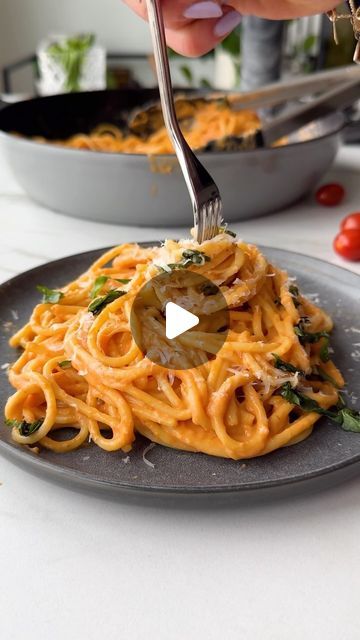 Erin Clarke | Easy Healthy Recipes on Instagram: "POV: Pasta is a pleasure. Roasted Garlic Tomato Ricotta Pasta has baked feta pasta vibes, but I use creamy ricotta so the sweetness of the roasted garlic and the caramelized cherry tomatoes can shine!

FULL RECIPE below. BOOKMARK now, because I know you’re going to want to make this later!

Back when Ben was in grad school, we ate pasta almost every night because it was cheap and filling. Now, I eat it because it brings me joy, AND because it’s fast and easy... and quick, delish dinners like this pasta recipe make me happy too!!

FULL RECIPE below. Follow @wellplated for more simple-but-fabulous dinner recipes like this one!

YOU’LL NEED:
-20 ounces cherry or grape tomatoes, left whole
-3 T extra-virgin olive oil, divided
-1 small head garl Tomato Ricotta Pasta, Delish Dinners, Calabrian Chili Paste, Baked Feta Pasta, Baked Feta, Ricotta Pasta, Feta Pasta, Garlic Pasta, Whole Wheat Pasta