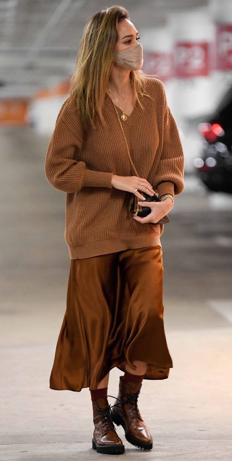 The Look for Less: Jessica Alba's Midi Slip Skirt and Personalized Celine Bag Long Sweater With Skirt, Brown Lace Boots Outfit, Brown Sweater Skirt Outfit, Sweater Over Satin Dress, Sweater Outfits 2022, Midi Knit Dress Outfits, Satin Skirt And Boots, How To Style Brown Boots, Satin Skirt And Sweater Outfit