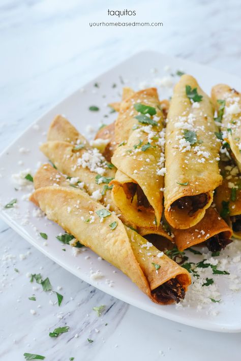 Taquitos are rolled tacos filled with chicken, beef or pork and cheese.  Fried to perfection for a delicious way to use leftovers! #chicken #beef #pork #fried #easy #mexican #fried #corntortillas #homemade Easy Taquitos, Homemade Taquitos, Rolled Tacos, Beef Taquitos, Salsa Ranchera, Taquitos Beef, Recipes To Try At Home, Taquitos Recipe, Delicious Dinner Recipes