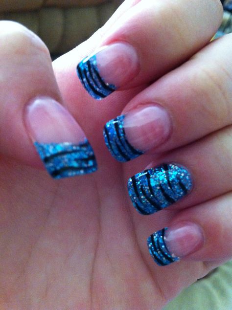 Glitter blue nails with tiger stripes. Pretty Blue Nails Short Glitter, Blue 2000s Nails, 2000s French Tip Nails Short, Blue Emo Nails, Blue Glitter Nails Short, Blue Zebra Print Nails, Blue Nails Y2k, Blue Zebra Nails, Glitter Blue Nails