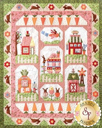 Bunny Town - Set of 7 Patterns + Accessory Fabric Packet Celebrate Spring with this adorable Bunny Town Quilt designed by The Quilt Company! The Bunny Town quilt finishes to approximately 54½" x 68½" and is overflowing with a darling bunny town, cute little bunnies and plenty of carrots! Easter Quilts, Quilt Applique, Appliqué Quilts, Bunny Quilt, Christmas Houses, Holiday Quilts, House Quilts, Adorable Bunny, Shabby Fabrics