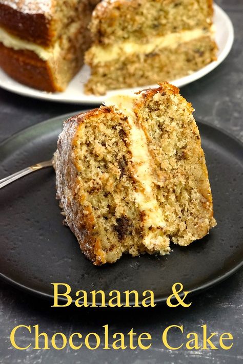 A slice of Banana & Chocolate Cake on a dark background. Behind can just be seen another slice and the rest of the cake. Banana Chocolate Cake Recipe, Genoa Cake, Moist Coconut Cake, Flavoured Buttercream, Victoria Sponge Cake Recipe, Banana Chocolate Cake, Coconut Icing, Sponge Cake Recipe, Victoria Sponge Cake