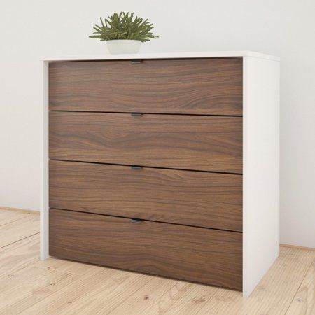 The Nexera 4-drawer chest is offered in a trendy white and walnut finish bringing both storage space and modern flair to your bedroom. The top panel is made of scratch, water and stain resistant melamine which combines style and functionality. The 4 drawers are mounted on solid metal slides and provide convenient storage for your clothes and personal belongings. Size: 30.75 x 18 x 31.75. Chest Of Drawers Decor, Clothes Drawer, Modern Chest Of Drawers, 4 Drawer Chest, Cabinet Color, Futuristic Furniture, Bedroom Chest, White Chests, Drawer Design