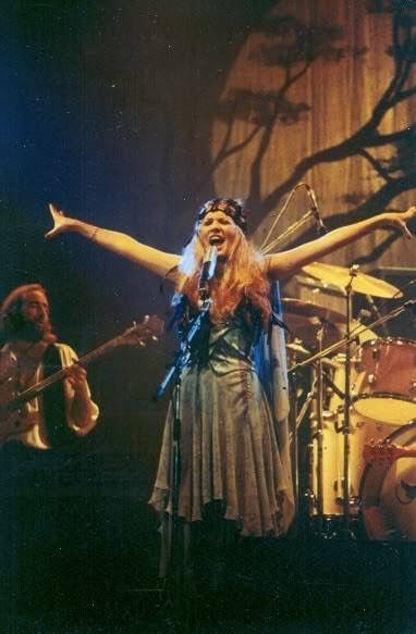 Stevie onstage  ~ ☆♥❤♥☆ ~ 'Rhiannon' with John McVie behind her as well as the iconic bare tree backdrop,  on July 19th, 1978 ~  https://en.wikipedia.org/wiki/Rhiannon_(song) Welsh Witch, John Mcvie, Buckingham Nicks, Stevie Nicks Style, Stephanie Lynn, Ancient Queen, Lindsey Buckingham, Rock Queen, Stevie Nicks Fleetwood Mac