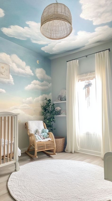 Dive into a Pisces' dreamland with this whimsical nursery! 🌙✨ Featuring a cloud ceiling mural and soft textures, every corner enchants. A cozy rocking chair, dreamy lighting, and storybook-inspired decor make it a perfect serene haven for little dreamers. 🐠☁️📚 Disney Character Nursery, Nursery Themes Clouds, Cloud Painting On Wall, Sky Mural Nursery, Blue Sky Nursery, Cloud Mural Ceiling, Cloud Ceiling Wallpaper, Ceiling Wallpaper Nursery, Whimsical Mural Ideas