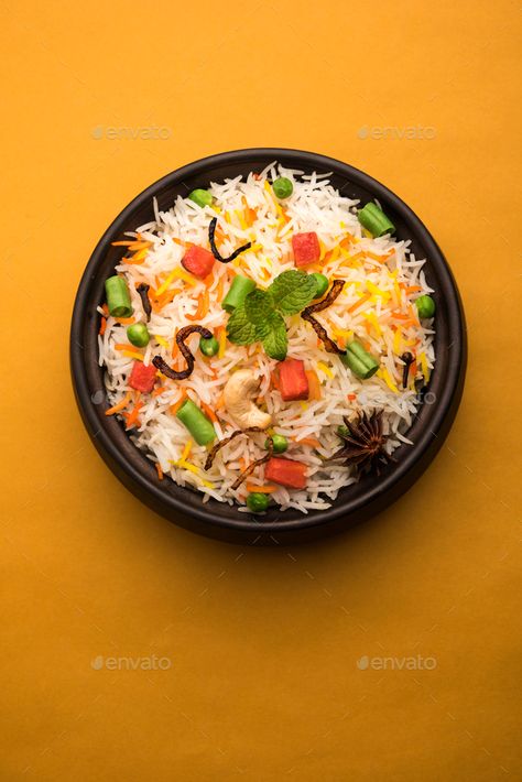 Veg Biryani by stockimagefactory. Indian Vegetable Pulav or Biryani made using Basmati Rice #Sponsored #stockimagefactory, #Indian, #Veg, #Biryani Veg Biryani Photography, Veg Pulav, Paneer Biryani, Vegetable Biryani, Veg Biryani, Cloud Kitchen, Dum Biryani, Recipes Snacks, Colorful Vegetables